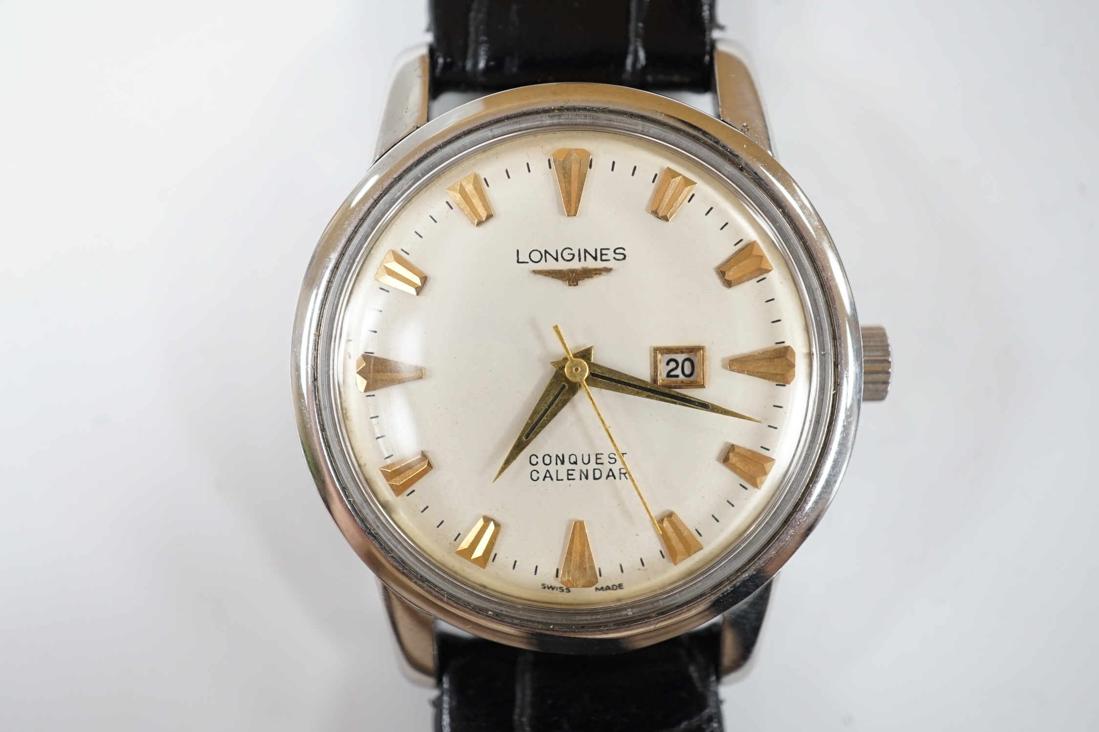 A gentleman's stainless steel Longines Conquest Calendar manual wind wrist watch, on Longines leather strap with Longines buckle, case diameter 35mm.